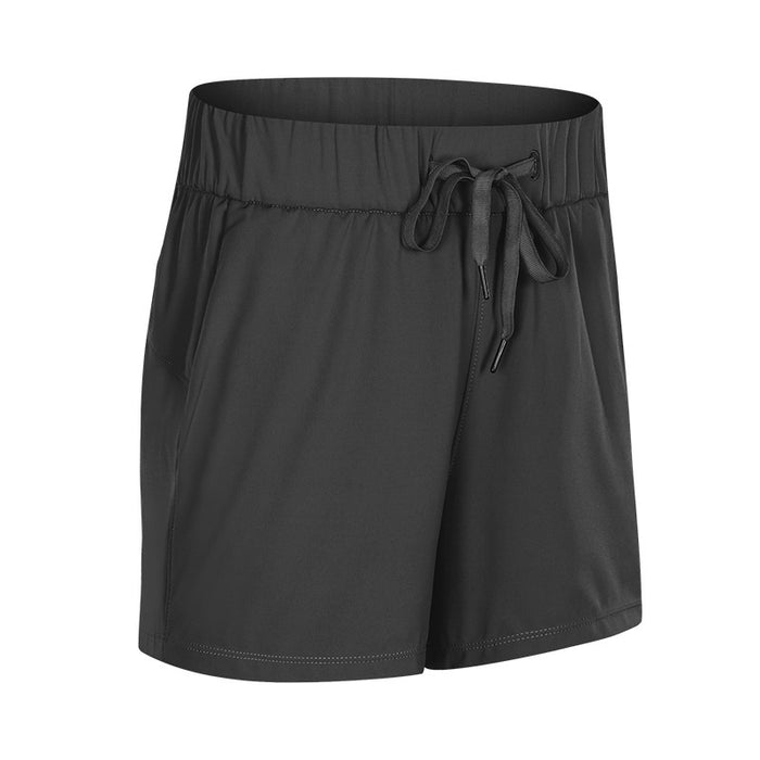 Short de sport ample en dentelle pour femme, extensible et respirant, idéal pour la gym, le yoga et autres activités physiques.