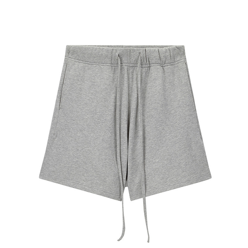 Pantalones deportivos cortos de felpa de marca de moda, holgados y combinables, con cordón y cinco puntos.