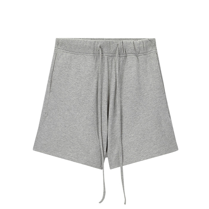 Pantalones deportivos cortos de felpa de marca de moda, holgados y combinables, con cordón y cinco puntos.