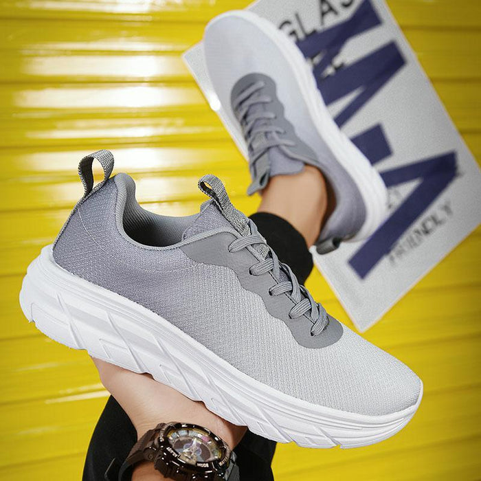 Zapatos de hombre de viaje de malla transpirables y cómodos con plataforma.