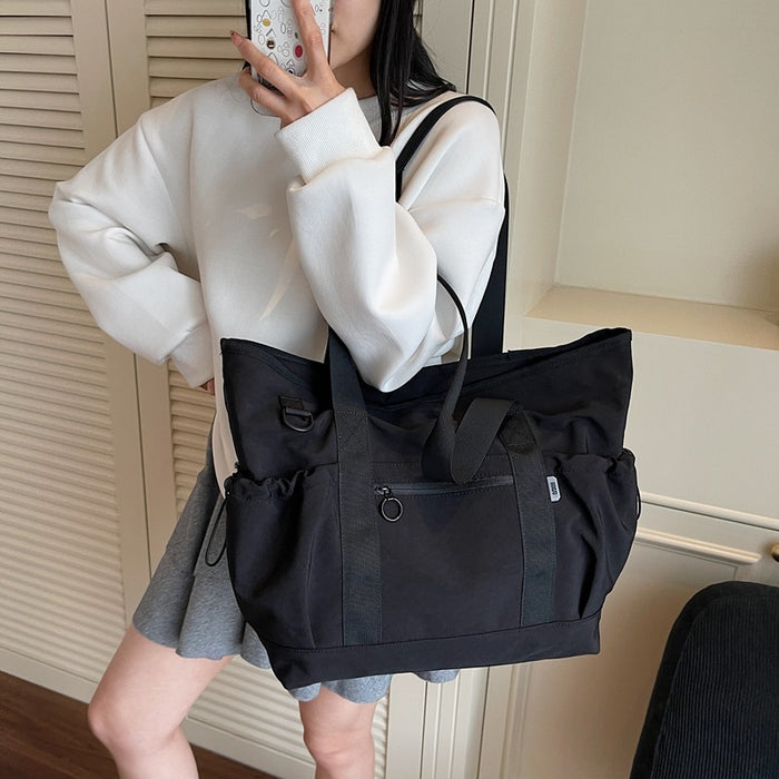 Sac de voyage léger pour femme, idéal pour le yoga et le fitness.