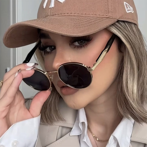 Lunettes de soleil rondes à monture métallique avec protection UV pour femmes