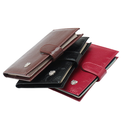 Étui à passeport double compartiment en cuir ciré à l'huile et aux ferrures décoratives