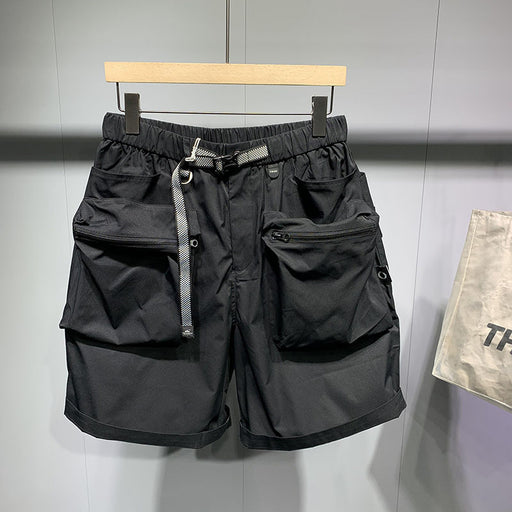 Short d'été ample à poches larges pour homme, style décontracté et tendance.