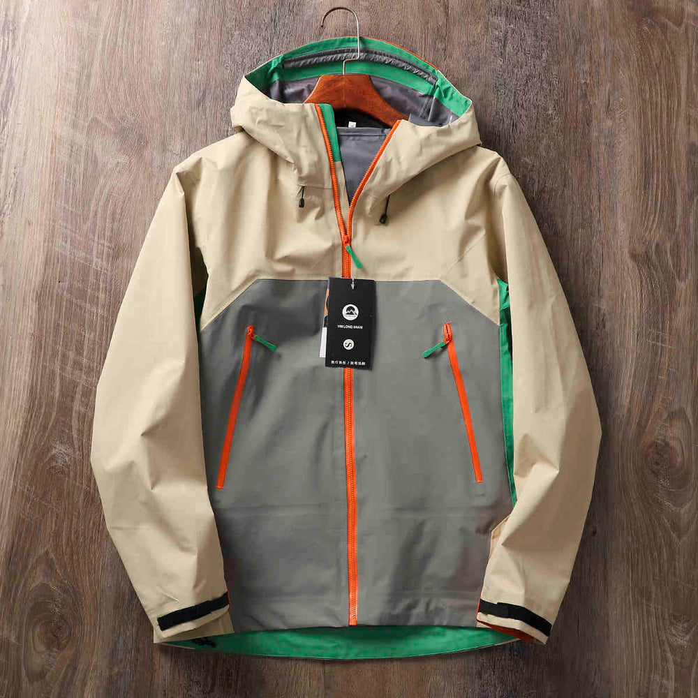 Chaqueta exterior impermeable y resistente a la lluvia con pegamento a presión completo.