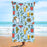 Serviette de plage double face en velours et brocart de polyester, absorbante, à séchage rapide et douce pour la peau.