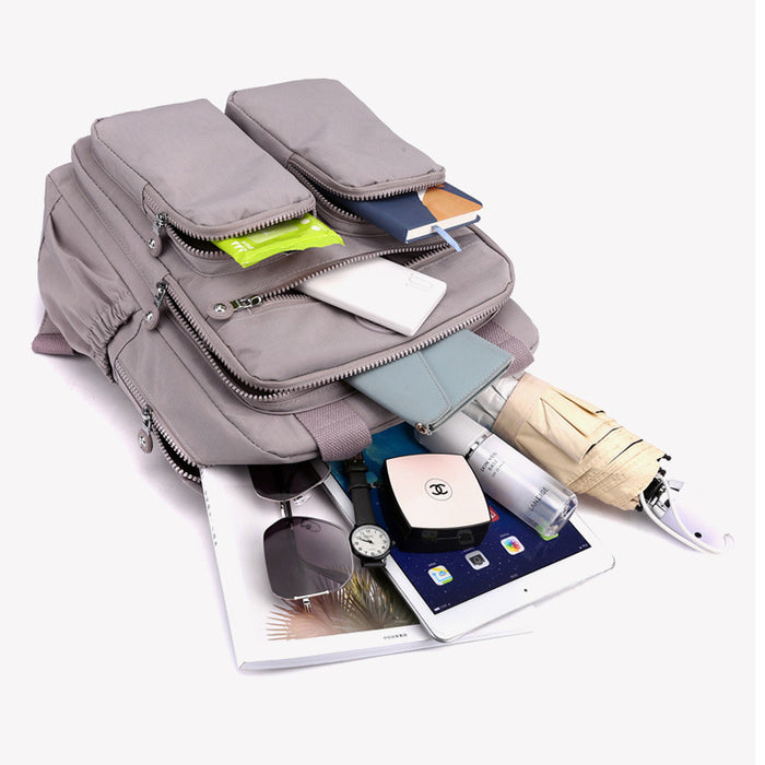 Mochila multifuncional de gran capacidad para mujer, impermeable y de viaje.