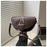 Sac à bandoulière de luxe, élégant, de niche, en forme de selle