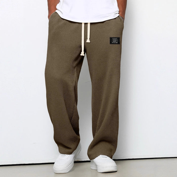 Pantalon de sport décontracté ample et droit pour homme, collection printemps-automne.